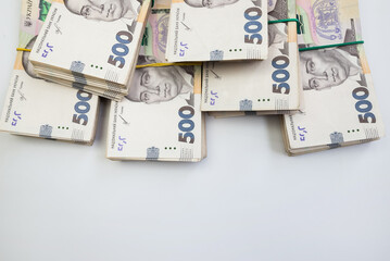 Ukraine money 500 hryvnia on white. Ukrainian finances, salary, pension, donations, taxes. Stacks...