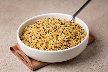 Cooked porridge, mix od red, white quinoa, bulgur and pasta. Cereal superfood concept.