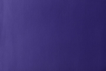 Texture of genuine leather, artificial leatherette violet, purple background