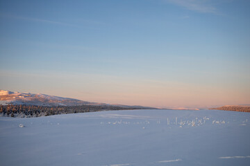 Snowy landscape winter scene in Swedish Lapland. Kiruna, Norrbotten County.