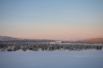 Snowy landscape winter scene in Swedish Lapland. Kiruna, Norrbotten County.