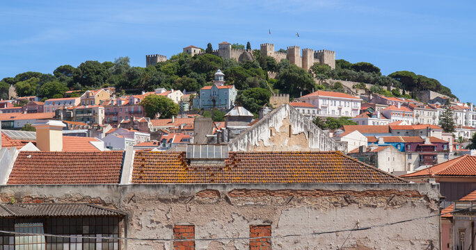 Fototapeta Panorama of the castle on a hill is the Portuguese capital Lisbon