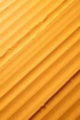 Corrugated yellow surface with textured pattern and light shadows