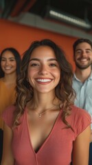 Obraz premium Smiling Young Professionals in a Modern Office, Happy Multicultural Team Standing Together, Positive Workplace Environment and Teamwork Concept