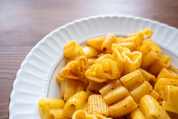 heart shaped pasta on a white background