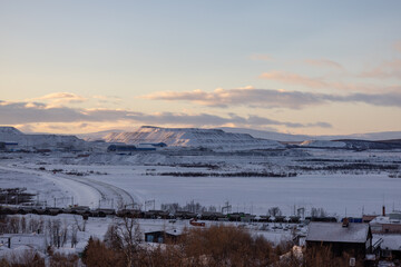 View of the new residential area by Luossavaara with low standing sun.