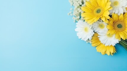 Bouquet of yellow flower on pastel blue background