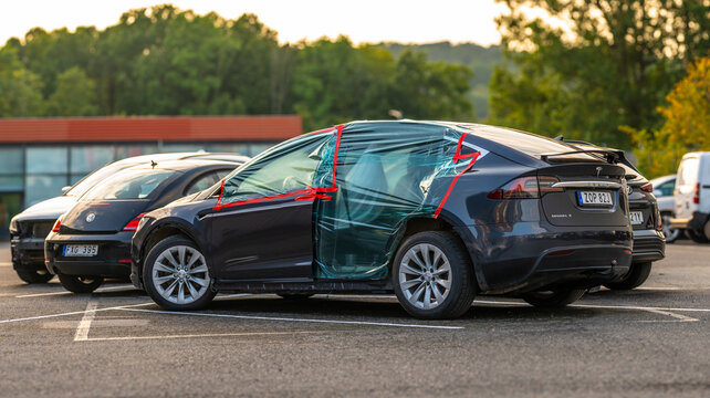 Gothenburg, Sweden - september 04 2024: Crash damaged Tesla Model X undergoing repairs.