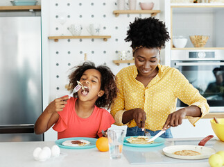 child family kitchen food girl daughter mother eating happy pancake breakfast cooking home adult black african american father man woman homemade dessert