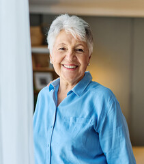 portrait senior woman elderly old retirement mature gray hair indoors happy happiness cheerful positive vitality healthy active retired female