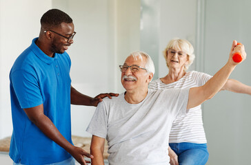therapist senior home exercise exercising patient physical woman girl therapy care nurse recovery...