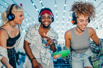 Young people dancing and having fun at music festival
