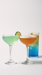 Set of mixed drinks in branded glassware against pure white backdrop with ample text area for labeling