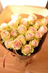 Large bouquet of light-colored roses