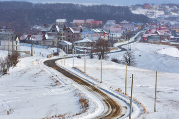 High voltage poles in the field in winter