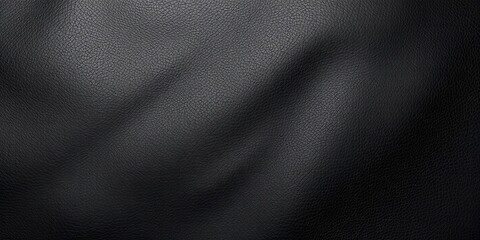 Textured black leather displaying a sleek and luxurious surface for background or design projects, black, leather