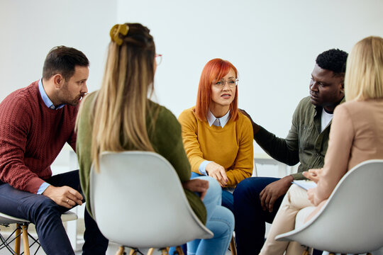 Support Group Members Sharing and Listening in a Discussion Circle