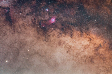 Galactic center of the Milky Way. The Milky way and the Lagoon nebula. Lagoon Nebula and Trifida. Photography of the Milky Way with telescope. Sagittarius Constellation © Hector