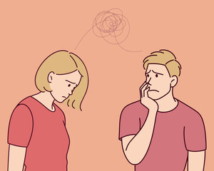 Worried white woman talking to a sad young man in distress. Emotional tension depicted.
