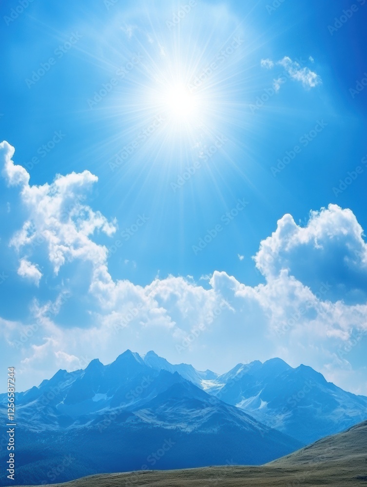 Poster majestic mountain range under a bright sun with soft clouds drifting in the blue sky creating a sere