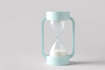 Modern hourglass on grey background. Time management concept