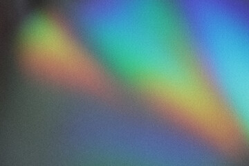 Colorful lens flare on black background.