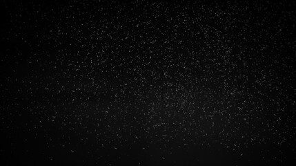 Fototapeta premium Particules et étoiles scintillantes et brillantes volant sur fond sombre, noir. Lumière, étoile, paillette dorée et flou. Cosmos, univers, espace. Fond pour bannière, conception et création graphique.