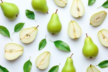 Obraz premium Isolated green pear slices on a white background viewed from above