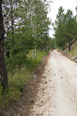 Fototapeta premium Man with e-bike on the George S. Mickelson Trail, South Dakota