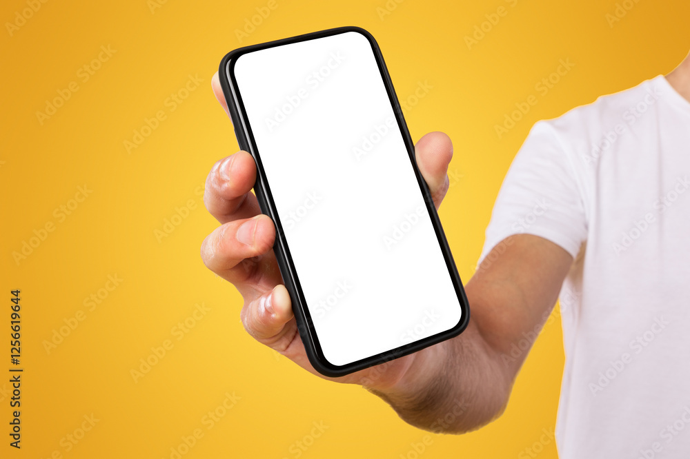 Aufkleber Mobile Application Ad. Close Up Of Man Showing Smart Phone Empty Screen Recommending App Standing On Yellow Orange Studio Background. Isolated Transparent Cellphone Display Mock Up, Check This Website