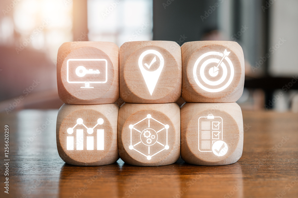 Poster wooden blocks with icons representing the objectives and key results concept for business strategy a