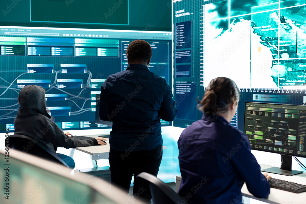Poster governmental hackers exploiting network systems in high tech office, executing cyber operations for 