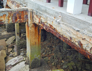 Concrete structures damaged by seawater.	
