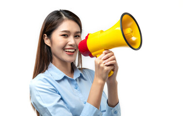 Portrait of smiling cheerful young pretty Asian woman holding megaphone making announcement isolated studio white background.