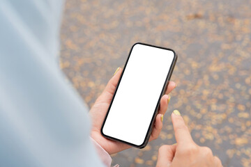 User interaction with smartphone interface urban setting digital content outdoor environment close-up view technology exploration