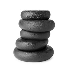 Stack of wet spa stones isolated on white