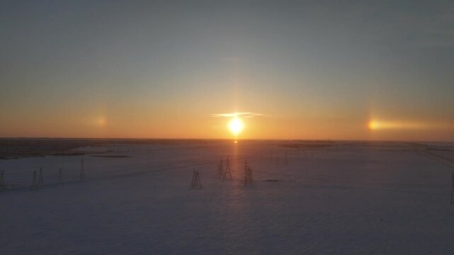 Cold Winter Sunset and Sun Dogs