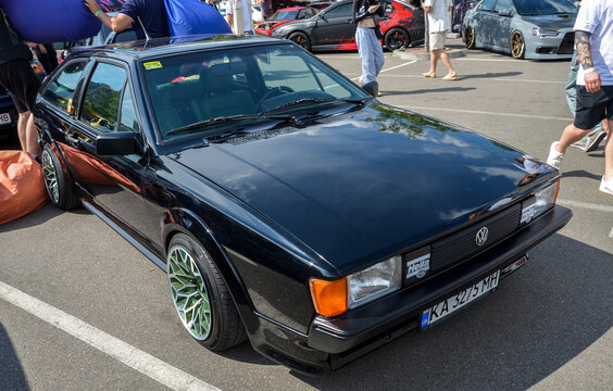 Black Volkswagen Scirocco, a sporty coupe known for its sharp handling, distinctive design, and performance-oriented engine