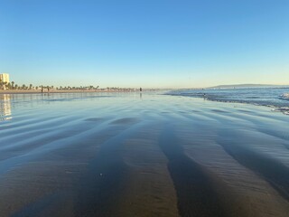 Low tide at the beach during sunset