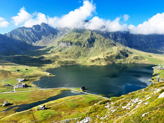 The alpine lake Melchsee or Melch Lake in the Uri Alps mountain massif, Kerns - Canton of Obwalden, Switzerland (Kanton Obwald, Schweiz)