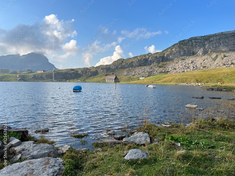 Poster The alpine lake Melchsee or Melch Lake in the Uri Alps mountain massif, Kerns - Canton of Obwalden, Switzerland (Kanton Obwald, Schweiz)