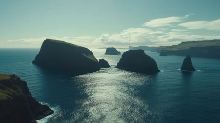 Faroe Islands ocean horizon, where the sea meets the sky, dotted with distant islets