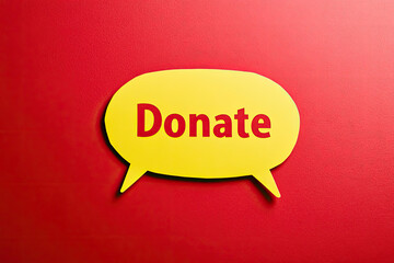 Yellow Speech Bubble with Red Donate Text on Red Background