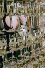 Elegant display of champagne glasses at a festive event filled with celebration and joy