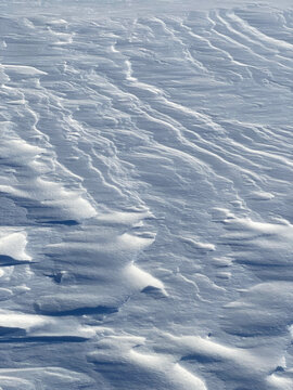 Wind-Sculpted Snow Texture with Natural Patterns