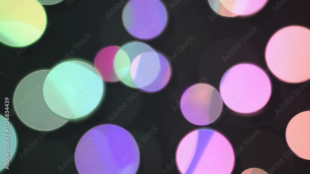 Poster colorful bokeh light movement in abstract glittering patterns with circular soft glow effects