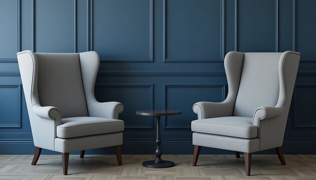 Elegant Gray Wingback Armchairs with Dark Wood Legs in a Blue Room