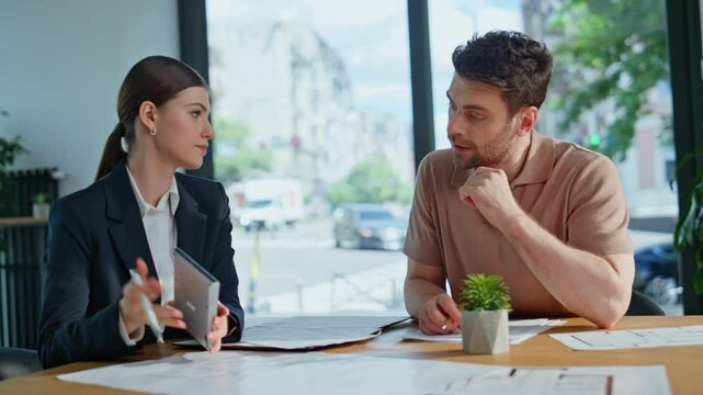 Professionals discussing tax papers at office meeting closeup. Woman calculating