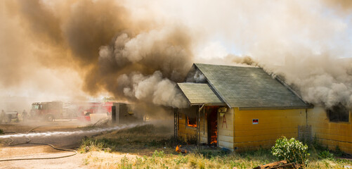Firefighters use full size buildings for true life training.