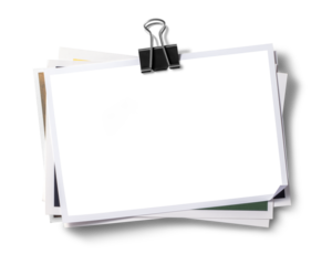 バインダークリップで束ねられた写真の、画像合成用素材